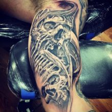 tattoo design - skull bones arm tattoo - Las Vegas Trip Ink Tattoo shop